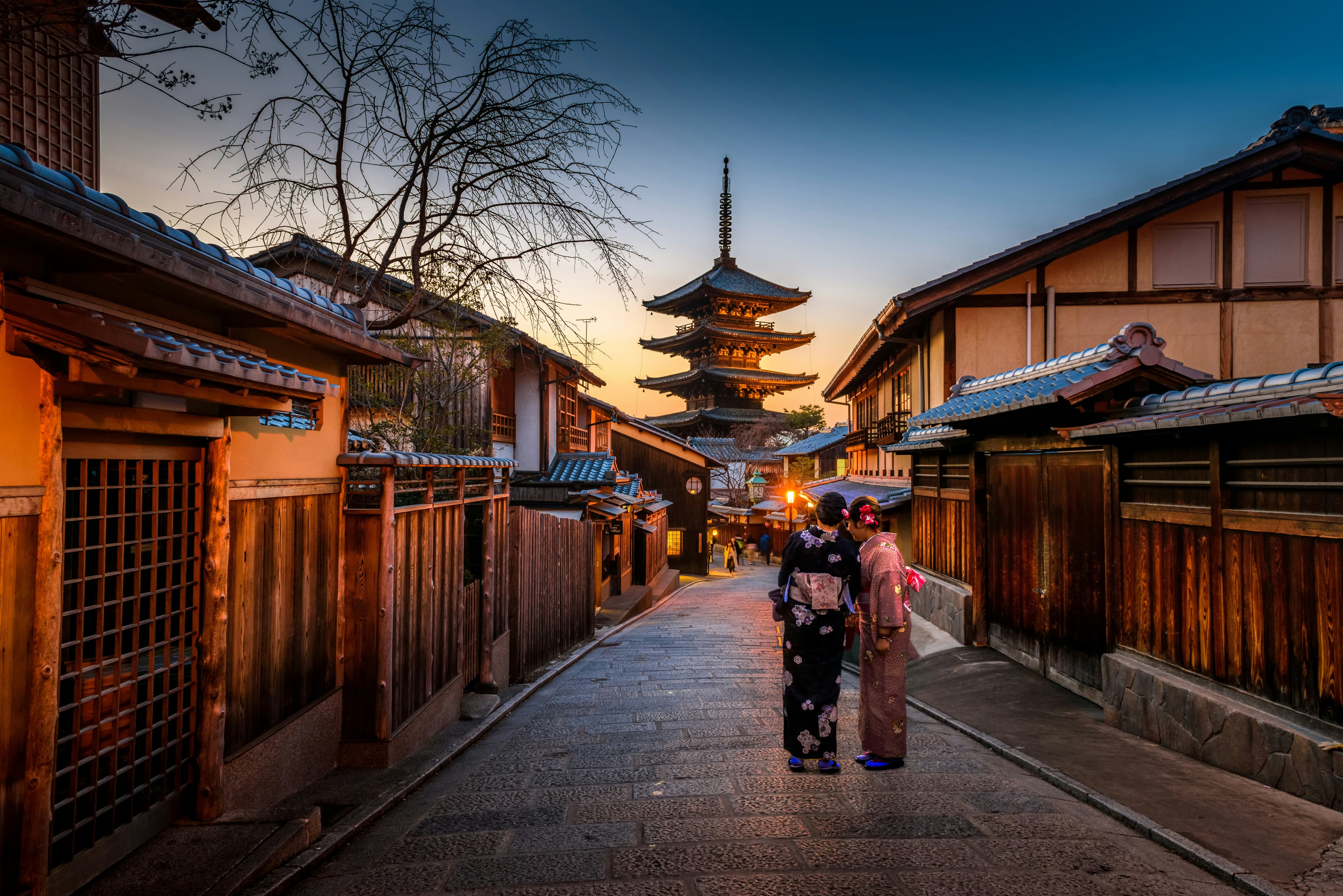 The Yasaka pagoda above a traditional Kyoto street at dusk