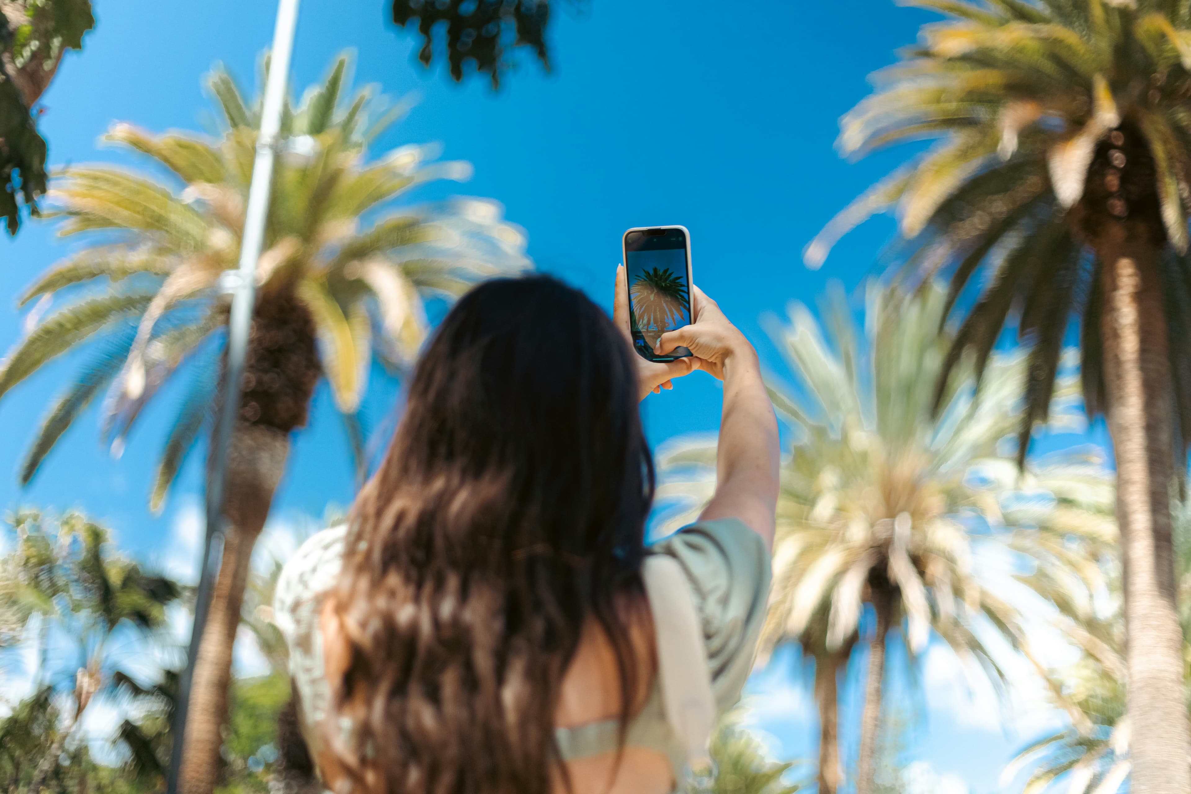 A woman taking a picture with her phone